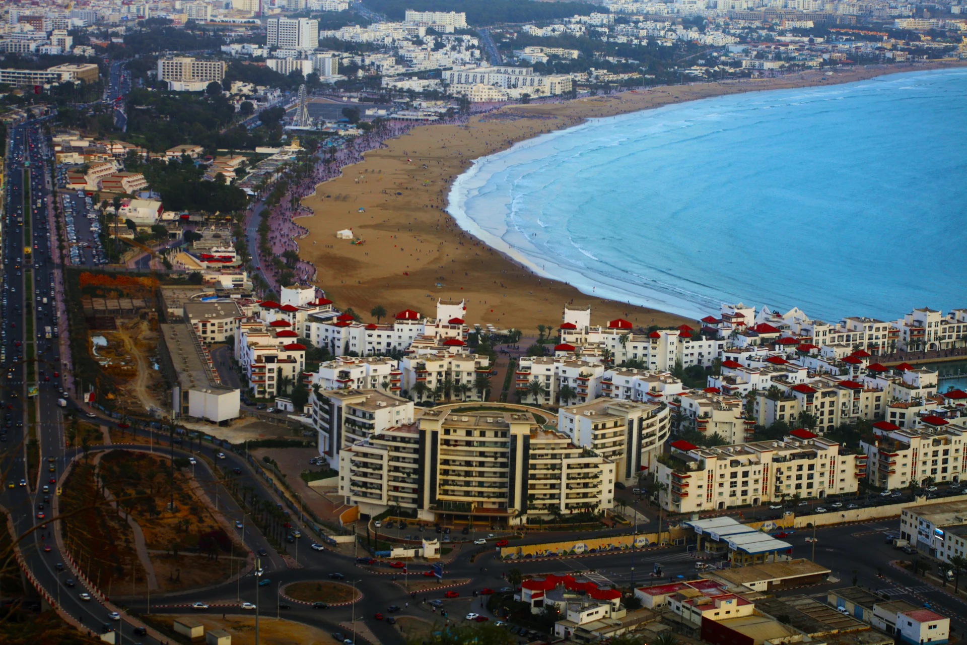 Agadir Bay with its sandy beach, promenade and city buildings viewed from above