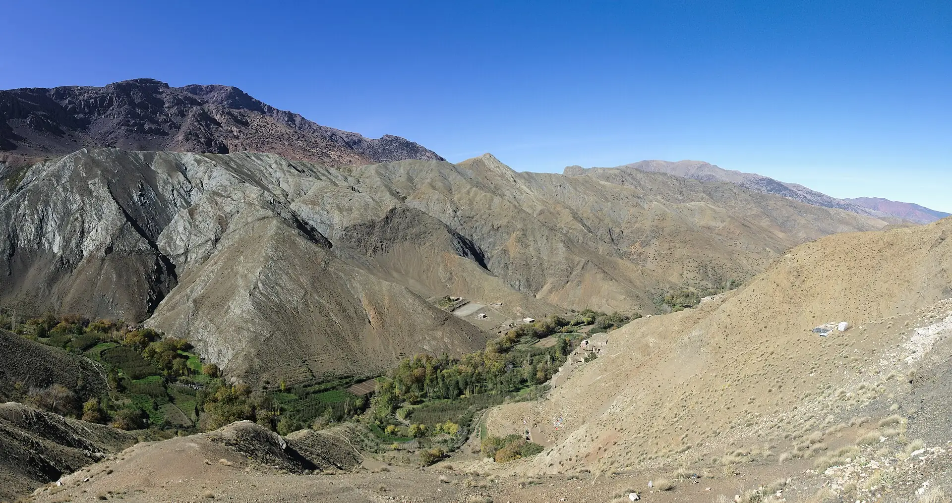 Switchback road climbing through bare mountain ridges at the Tizi n'Tichka pass in the Moroccan High Atlas