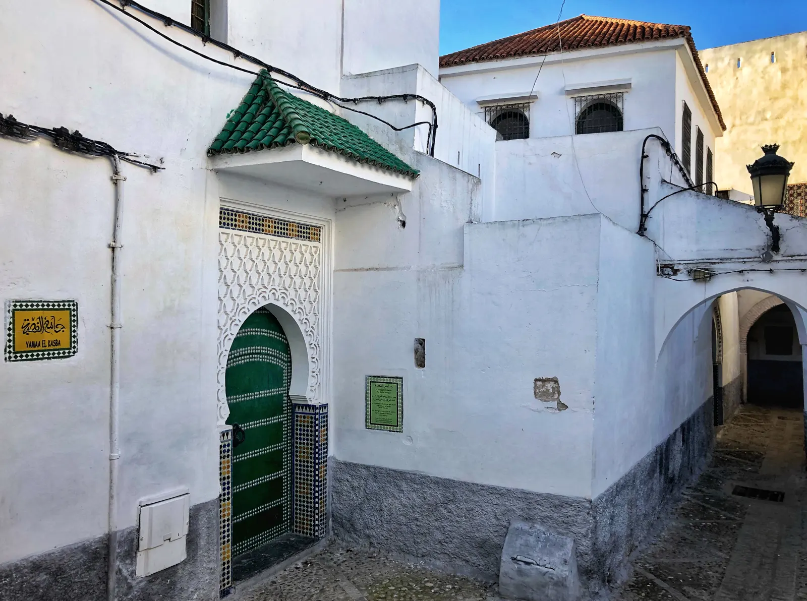 White houses of Tetouan's medina climbing the hillside below the Rif Mountains