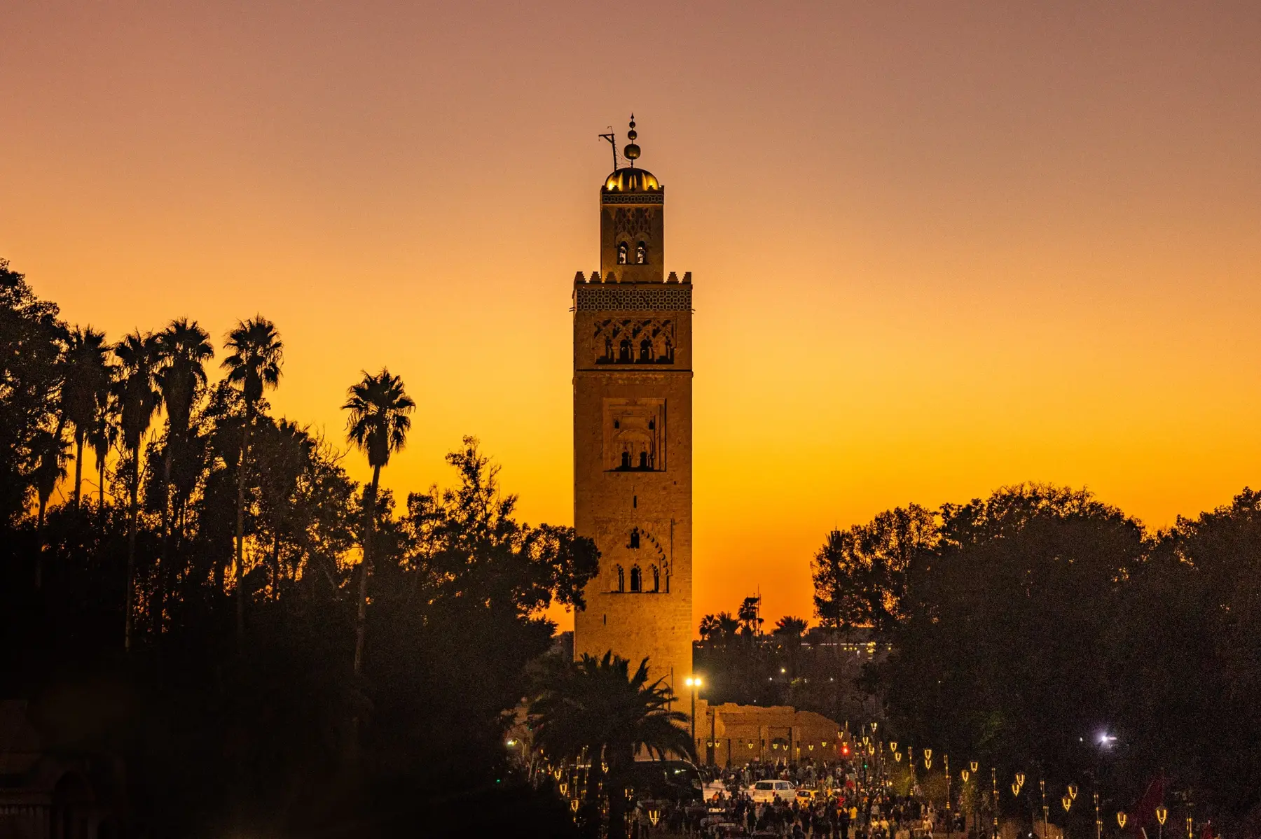 Koutoubia Mosque and Marrakech skyline at sunset
